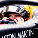 Max Verstappen pulls on his helmet before FP2.